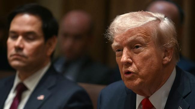 US President Donald Trump speaks as Secretary of State Marco Rubio looks on during a cabinet meeting at the White House. Picture: AFP