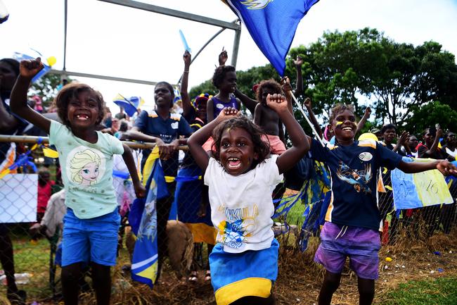 Ranku Eagles supporters go wild after a goal against the Tapalinga Superstars during this year's 49th Annual Tiwi Grand Final on Bathurst Island, 80km's north of Darwin, NT. Picture: Justin Kennedy