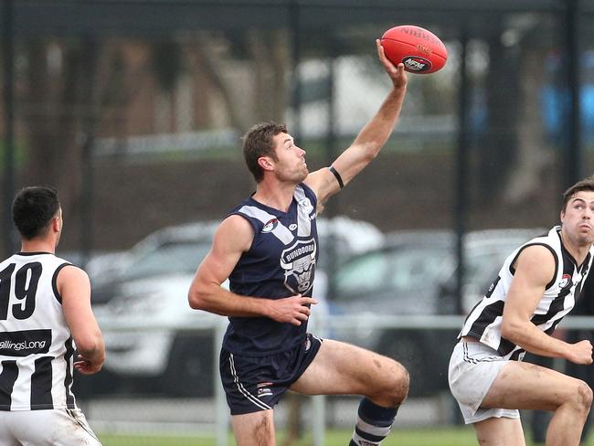 Matthew Dennis of Bundoora controls a ruck contest during NFL footy: Bundoora v Montmorency on Saturday, July 27, 2019, in West Coburg, Victoria, Australia. Picture: Hamish Blair