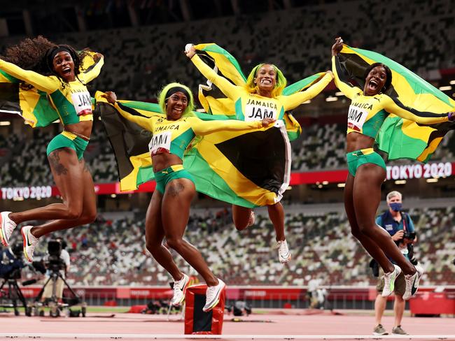 Briana Williams, Elaine Thompson-Herah, Shelly-Ann Fraser-Pryce and Shericka Jackson celebrate gold in the relay in Tokyo in 2021. Picture: David Ramos/Getty Images