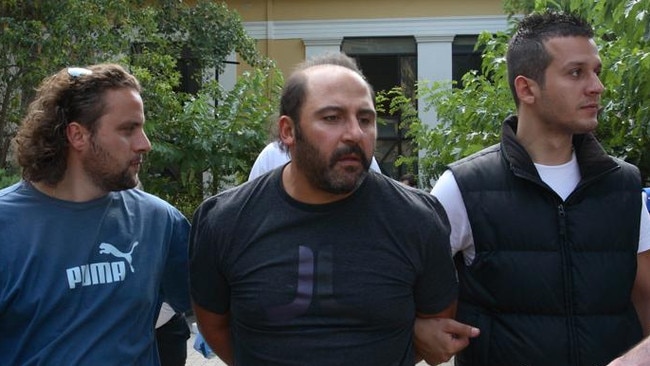 Tony Mokbel leaving a court appearance in Greece in 2007. Picture: Supplied