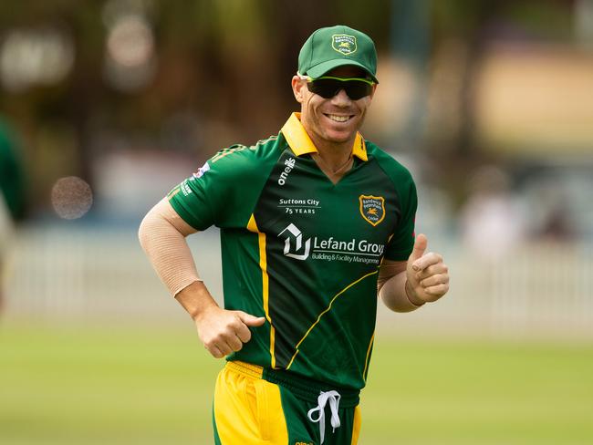 David Warner was watched on by his family as he made a return to the grade cricket scene. Picture: AFP