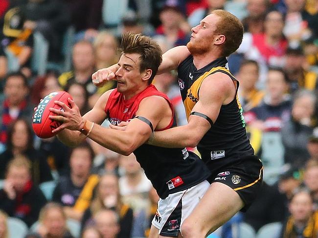 Tyson marks in front of Nick Vlastuin. He finished with two goals and 23 possessions.