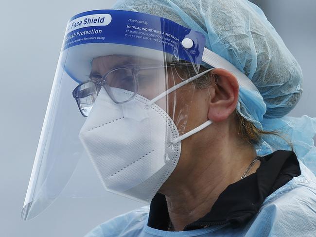 MELBOURNE, AUSTRALIA - NewsWire Photos SEPTEMBER 18, 2020:   Health workers are seen in full PPE at a pop-up COVID19 test site in Clyde, Melbourne, Victoria. Picture: NCA NewsWire / Daniel Pockett