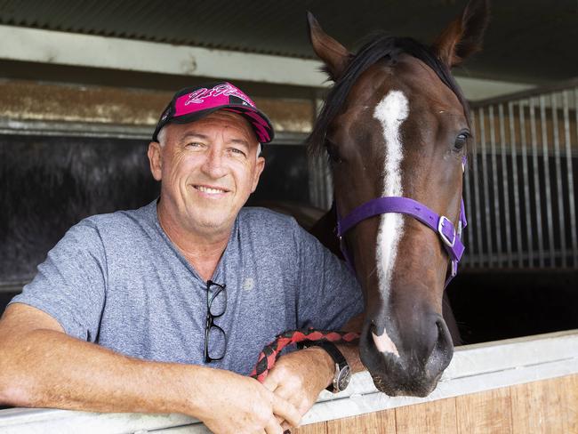 Trainer Rob Heathcote and Rothfire posing at Eagle Farm Racecourse, 230 Lancaster Rd, Ascot, Brisbane, 27th of February 2020. (AAP Image/Attila Csaszar)