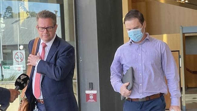 Liam Joel Bromilow (wearing a mask) leaves Ipswich Court with his lawyer on Wednesday. Picture: Nicola McNamara