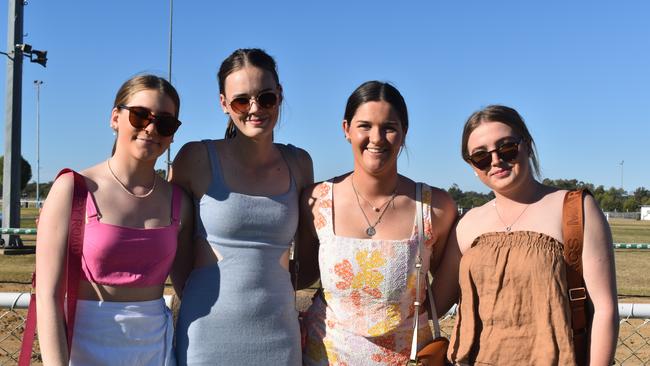 Charla, Maggie, Luca and Claire at the Roma Rugby Races at Bassett Park on Saturday June 24, 2023. Picture: Chloe Cufflin.