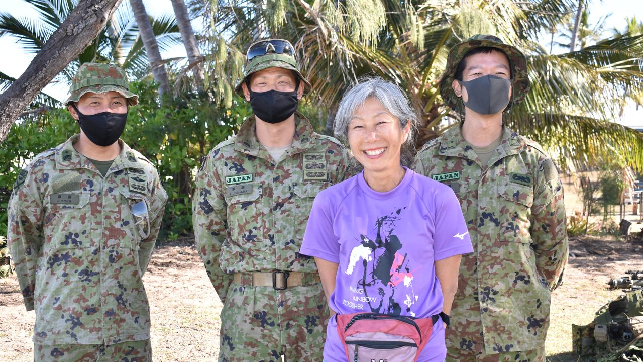 Sakae Moriwaki, visiting Australia from Auckland, NZ, enjoyed a chat with Japanese soldiers Master Sergeant Hiroshi Torii, Master Sergeant Kunihiko Unehara, and Sergeant Naoyo Motohashi of Sasebo, Kyushu Island, at the Exercise Talisman Sabre open day at Bowen. Picture: Kirra Grimes