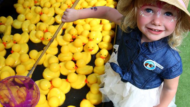 Phoebe Hutchings has fun with the lucky duck fishing spot. Pictures: Carmela Roche