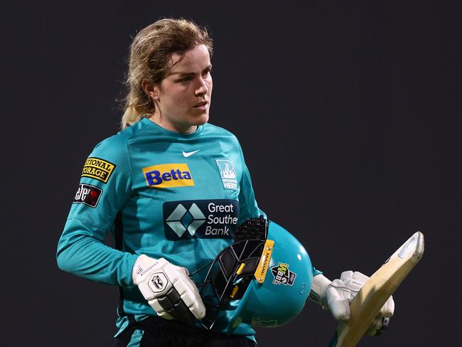 BRISBANE, AUSTRALIA - OCTOBER 25: Georgia Redmayne of the Heat is dismissed during the Women's Big Bash League match between the Brisbane Heat and the Sydney Thunder at Allan Border Field, on October 25, 2022, in Brisbane, Australia. (Photo by Chris Hyde/Getty Images)