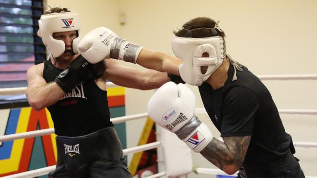 Liam Paro (right) sparring with Jeff Horn. Picture: Peter Wallis
