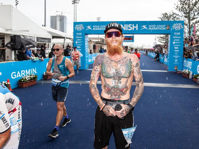 Gold Coaster Jake Malby finishes the 2019 Gold Coast Marathon. He will run 31 marathons in 31 days in August.