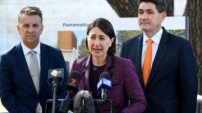 Andrew Constance, Gladys Berejiklian and Geoff Lee speak to the media at Parramatta River on Monday. Picture: AAP