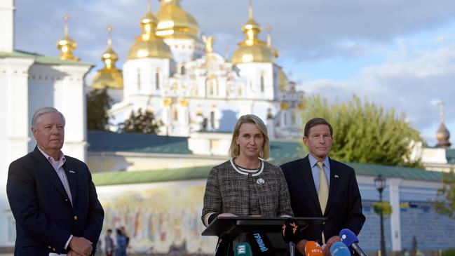 Bridget Brink, centre, in Kyiv with the senators Lindsey Graham and Richard Blumenthal in August. Picture: Kanuka Ruslan/Getty Images