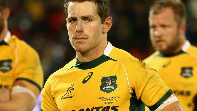 MENDOZA, ARGENTINA - OCTOBER 04: Bernard Foley of the Wallabies and team mates look dejected after losing The Rugby Championship match between Argentina and the Australian Wallabies at Estadio Malvinas Argentinas on October 4, 2014 in Mendoza, Argentina. (Photo by Cameron Spencer/Getty Images)