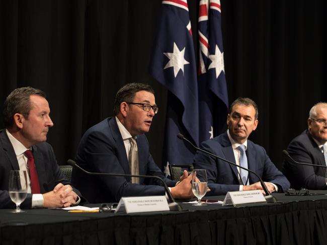 Victorian Premier Daniel Andrews (second from left) speaks during a press conference alongside (L-R) WA Premier Mark McGowan, SA Premier Steven Marshall, Prime Minister Scott Morrison and other heads of state following the Council of Australian Governments (COAG) meeting at the Cairns Convention Centre in Cairns, North Queensland, Friday, August 9, 2019. (AAP Image/Marc McCormack) NO ARCHIVING