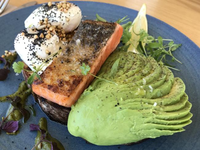 Ora king salmon with avocado and poached eggs.