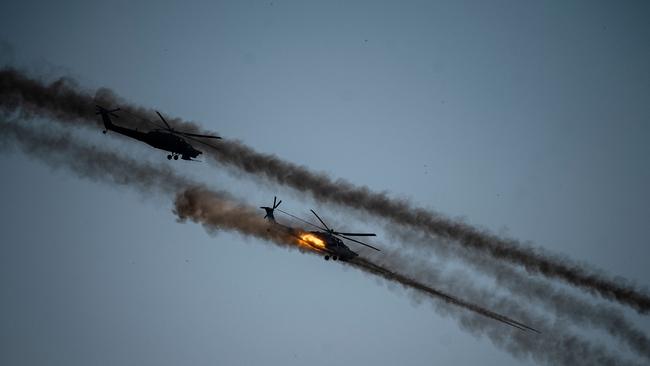 A Mi-28 helicopter launches rockets during military exercises at the Raevsky range in Southern Russia this week. Picture: AFP