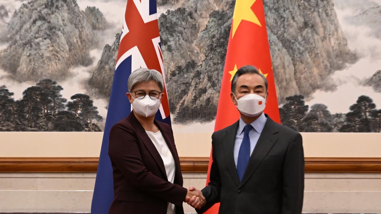 Australian Foreign Minister Penny Wong shakes hands with Chinese Foreign Minister Wang Yi at Diaoyutai State Guesthouse in Beijing. Picture: AAP Image/Lukas Coch/POOL NCA Newswire