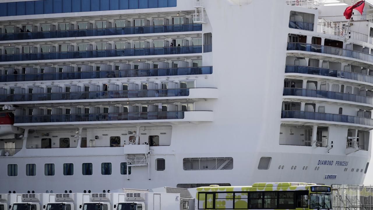 Around 180 Australian evacuees from the virus-hit cruise ship Diamond Princess have landed in Darwin today. (AP Photo/Jae C. Hong)