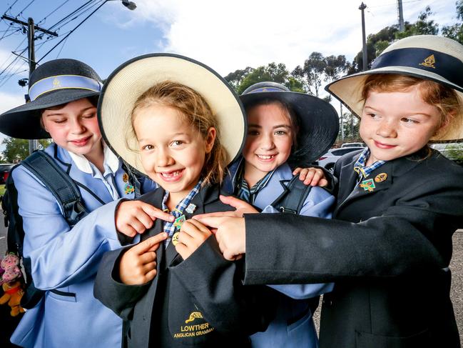 Ruby, 8, Alyssa, 7, Maddison, 8, and Jennah, 8 all have walk to school badges. Picture: Tim Carrafa