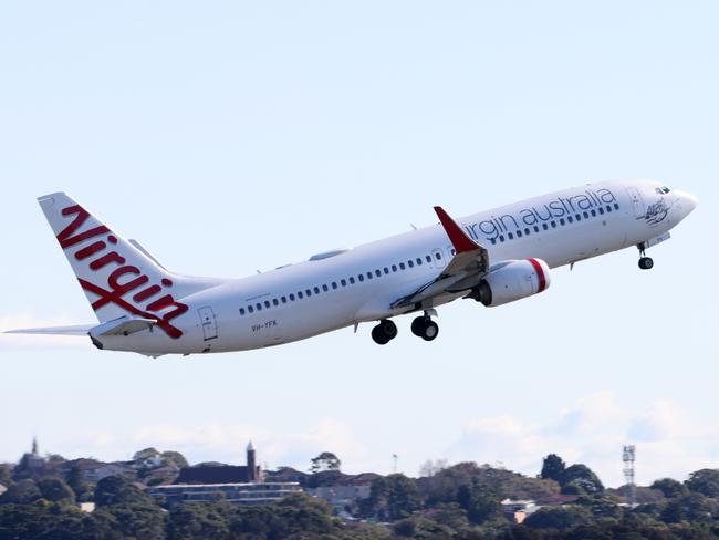 SYDNEY, AUSTRALIA - NewsWire Photos JUNE 10, 2022: Virgin Plane takes off at Sydney airport. Picture: NCA NewsWire / Damian Shaw