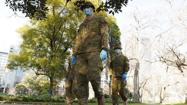 Members of the ADF (Australian Defence Force) patrol the streets in Melbourne. Picture: Getty Images