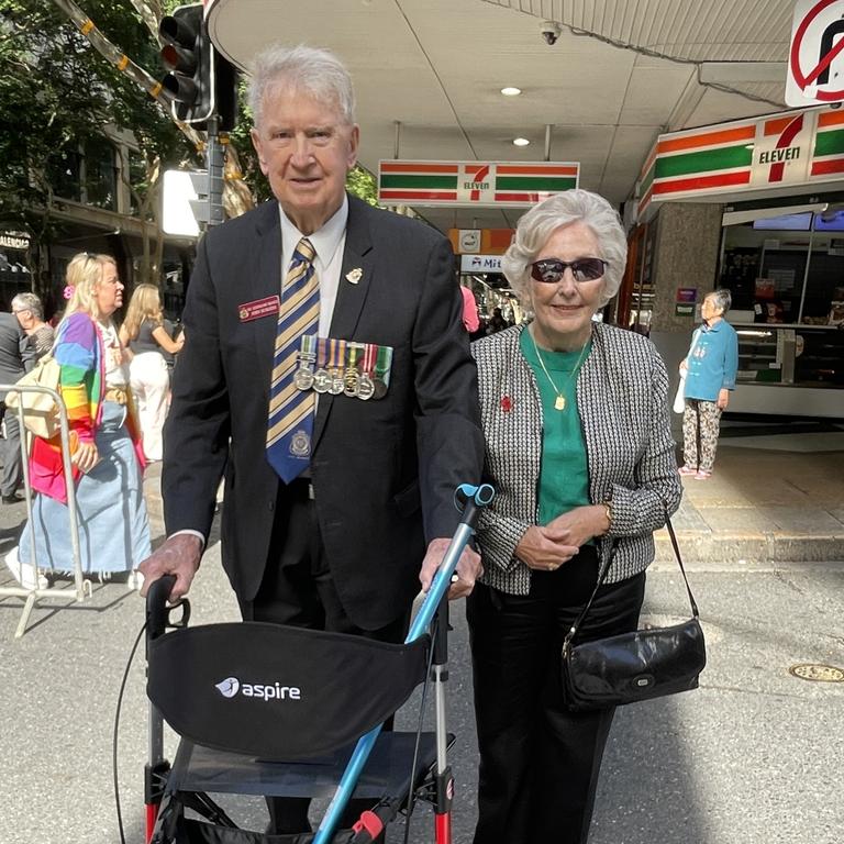 95-year-old veteran Squadron Leader John Burgess and his wife Jill marching in Brisbane city.