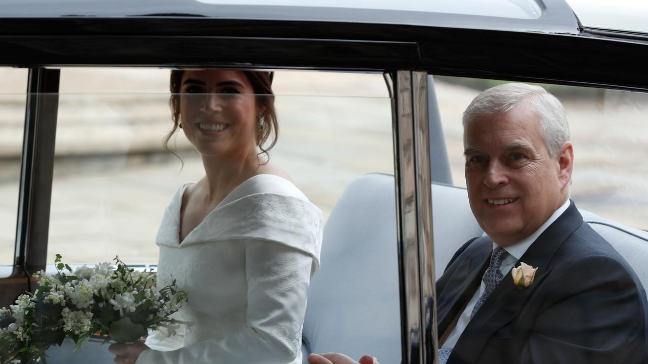 Princess Eugenie of York with Prince Andrew on her wedding day in 2019. Picture: Adrian DENNIS / POOL / AFP.