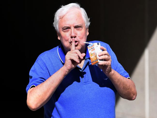 Businessman and former federal MP Clive Palmer gestures to the waiting media as he leaves the Federal Court in Brisbane, Wednesday, May 17, 2017. Mr Palmer faced another round of questioning by liquidators for his failed Queensland Nickel company that collapsed in early 2016, with creditors owed about $300 million and leaving almost 800 refinery workers without jobs. (AAP Image/Dan Peled) NO ARCHIVING
