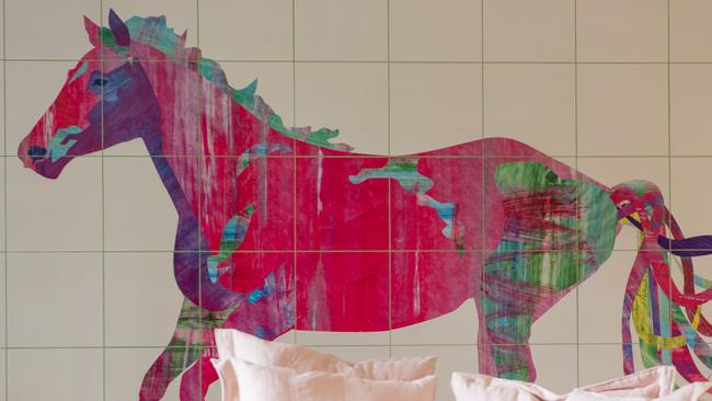 A painting of her beloved warmblood horse, Liliana, by artist and friend Mardi Featherston, has been enlarged and printed on tiles on the playroom wall. Picture: Ian Wilson Photography