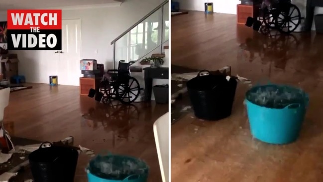 Rain pouring into a Gold Coast home