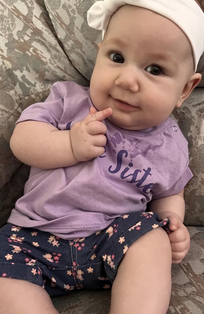 The Queensland Times Cutest Ipswich Summer Baby 2022 competition: “Cheeky miss Harper in her Harry Potter clothes, watching mummy and laughing.” Picture: Krystina