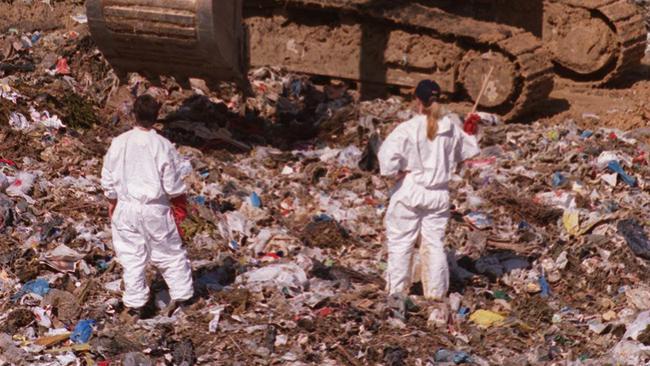 May 24, 1999: Police search through rubbish at Labrador tip for the body of Japanese millionaire Hamago Kitayama who was reported missing by wife on May 17, 1999 from their Gold Coast apartment. Pic Troy Purdue