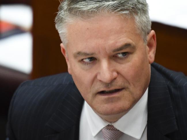 Australian Finance Minister Mathias Cormann reacts during Senate Question Time at Parliament House in Canberra, Wednesday, May 13, 2020. (AAP Image/Lukas Coch) NO ARCHIVING