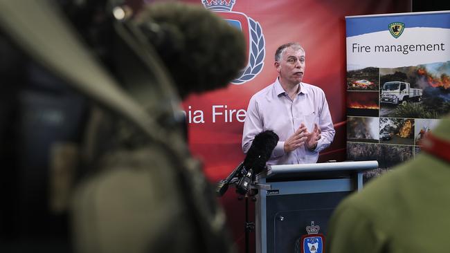 Simon McCulloch, from the Bureau of Meterology, speaking about weather conditions as 49 fire incidents continue statewide. Picture: LUKE BOWDEN