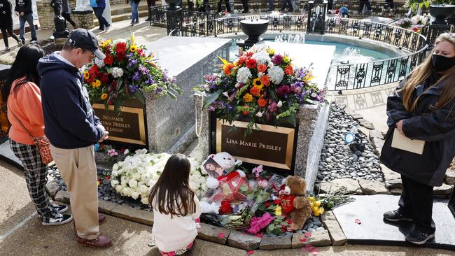 Mourners visit the grave of Lisa Marie Presley at Graceland. Picture: Jason Kempin/Getty Images