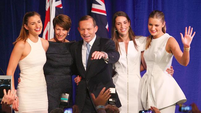 Former Prime Minister Tony Abbott and his family, from right, Bridget, Louise, wife Margaret and Frances during his victory speech after the 2013 federal election. Picture: Marianna Massey