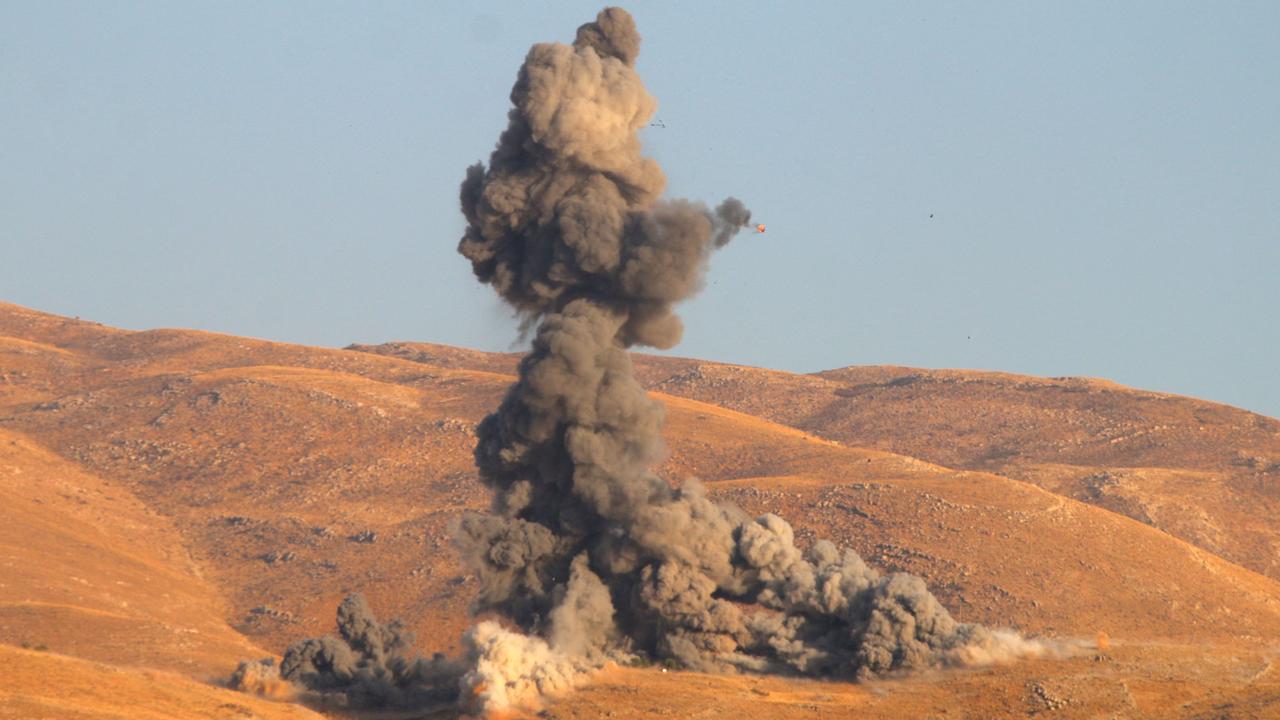 An explosion at a suspected Hezbollah weapons stash on September 23. (Photo by AFP)