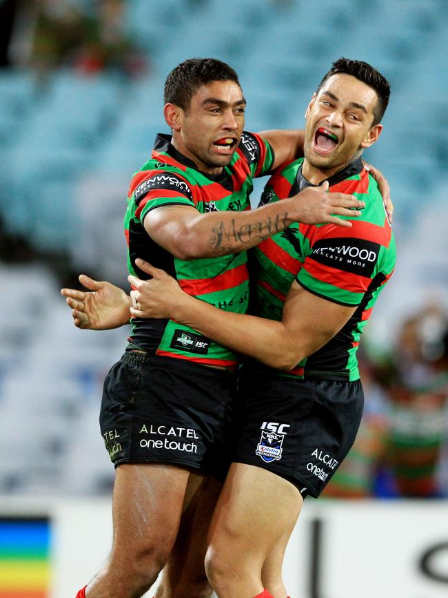 Merritt celebrates after scoring a try.