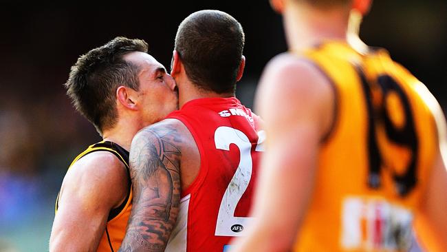 Hodgey plants a kiss on old mate Buddy. Picture: Tim Carrafa