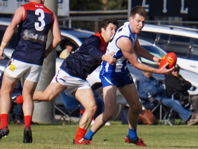 Ouyen United's Dallas Willsmore remains calm under pressure in the match against Mildura in the Sunraysia league. Picture: Michael DiFabrizio