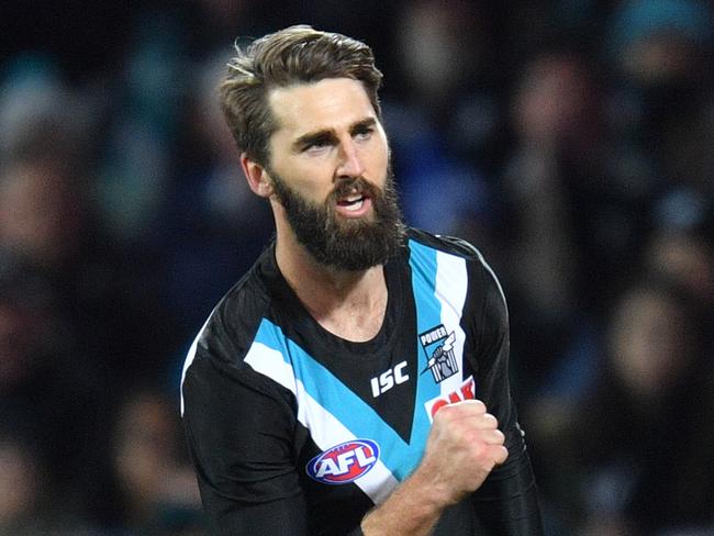 Justin Westhoff of the Power reacts after scoring during the Round 14 AFL match between the Port Adelaide Power and the Melbourne Demons at Adelaide Oval in Adelaide, Friday, June 22, 2018. (AAP Image/David Mariuz) NO ARCHIVING, EDITORIAL USE ONLY