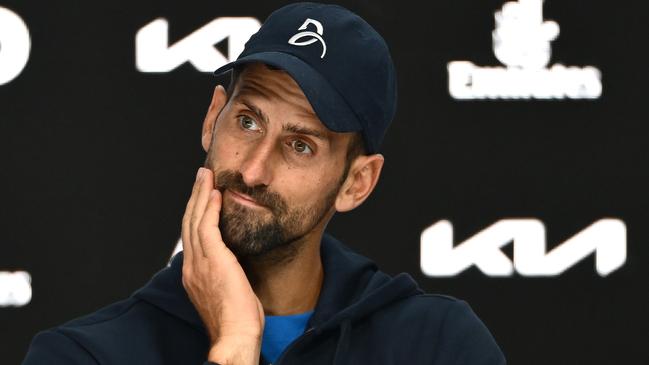 MELBOURNE, AUSTRALIA - JANUARY 24: Novak Djokovic of Serbia attends a press conference after retiring from the Men's Singles Semifinal against Alexander Zverev of Germany during day 13 of the 2025 Australian Open at Melbourne Park on January 24, 2025 in Melbourne, Australia. (Photo by Quinn Rooney/Getty Images)