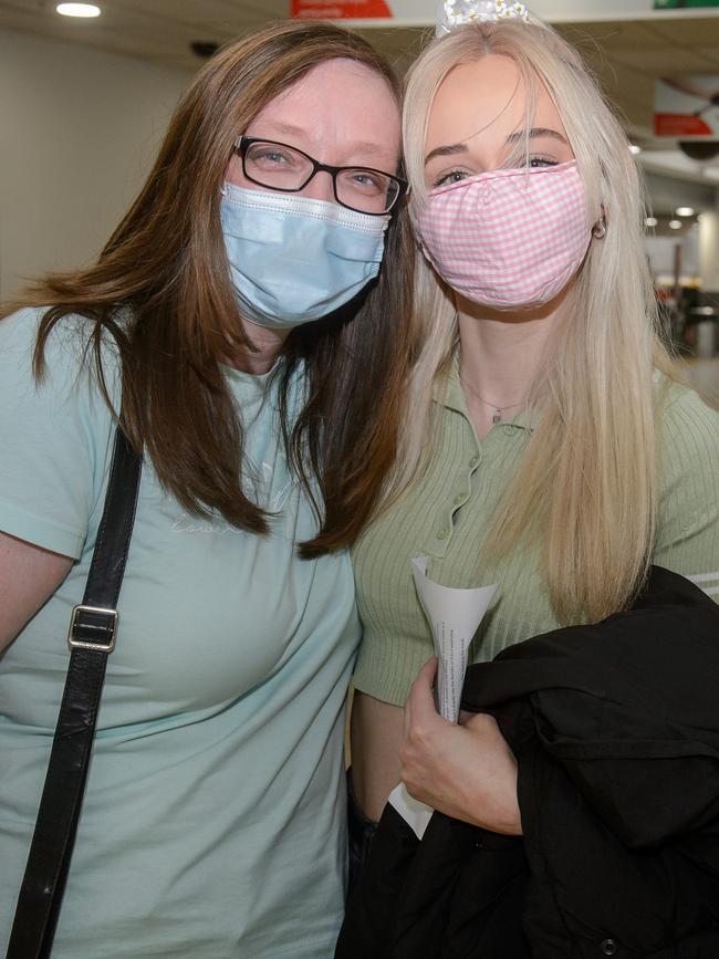 A very happy mother and daughter reunited at Melbourne Airport. Picture: Jay Town