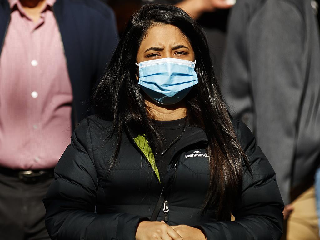 A person wearing a mask is seen walking along Swanston Street on May 12, 2021 in Melbourne. Picture: Daniel Pockett/Getty Images