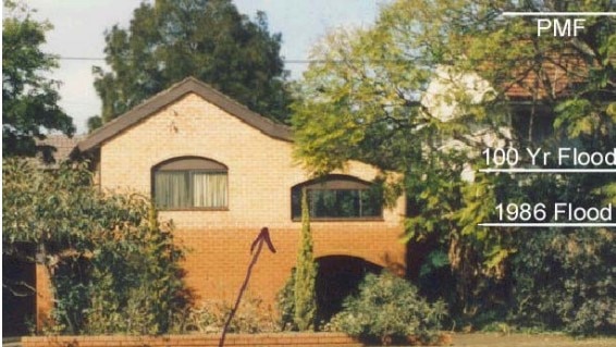 Flood levels seen on a Moorebank home in 1986, and the possible maximum flood for the area. Two storey homes would be completely submerged. Picture: Supplied