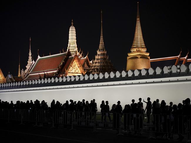 People gather, outside the Grand Palace, to pay their respects to Thailand's late King Bhumibol Adulyadej. Picture: Getty