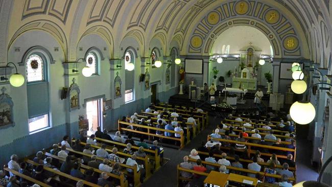 FAREWELL KEV: St Joseph's church was full of people wanting to say their goodbyes to their friend and family member, Kev. Picture: Meg Gannon