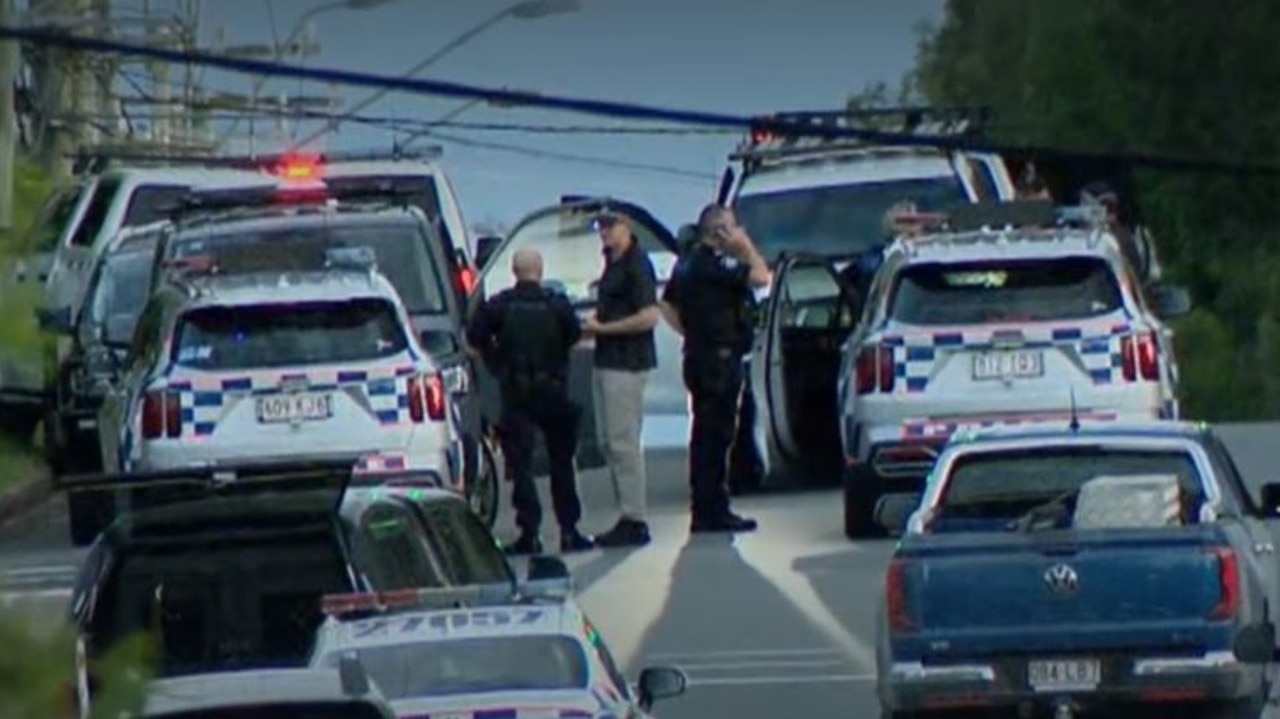 Specialist police swarm on SEQ suburb, man in custody after tense standoff